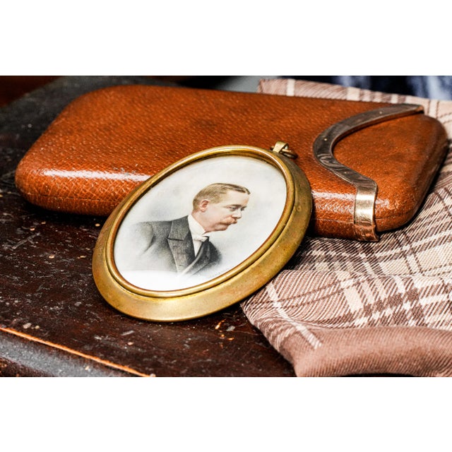 Exuding the elegance and refinement of a bygone era, this exquisite Victorian antique portrait miniature captures the side...