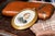 Exuding the elegance and refinement of a bygone era, this exquisite Victorian antique portrait miniature captures the side...