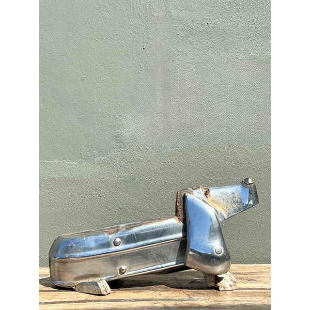 This captivating vintage abstract dachshund sculpture is a whimsical example of mid-century modern ingenuity, crafted from...