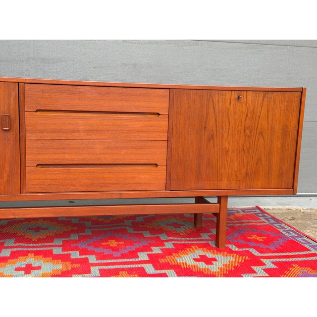 An exceptional and highly sought-after “Grande” credenza designed by Nils Jonsson for Troeds, Sweden. This extra-long...