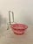 Antique cranberry Art glass bowl set in an metal silver holder. Features a vibrant pink or "cranberry" colored glass bowl...