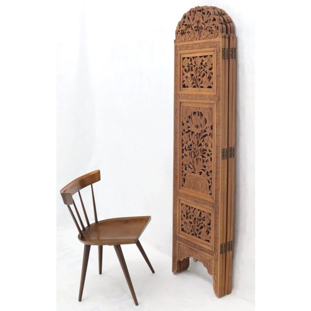 Pierced carving 4-panel teak room divider screen.