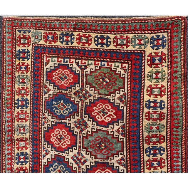 Antique Moghan Kazak Rug Showcasing Bold Geometric Medallions 4'6 X 6' For Sale - Image 4 of 11