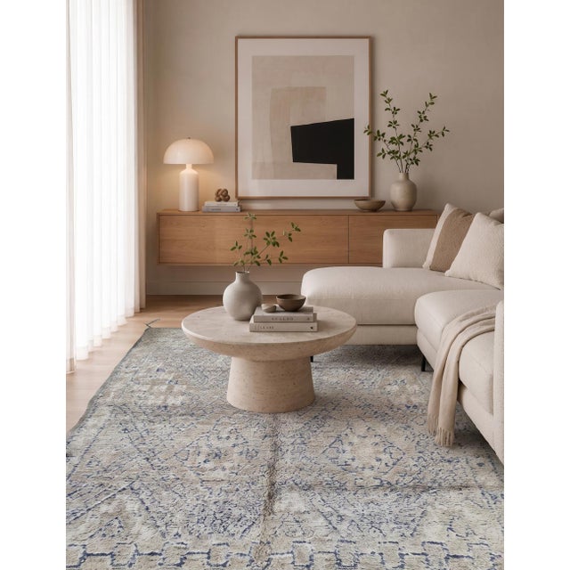 Vintage Beni M'Guild Rug | Handwoven Wool Rug with Faded Tribal Motifs This vintage Beni M'Guild rug carries a densely...
