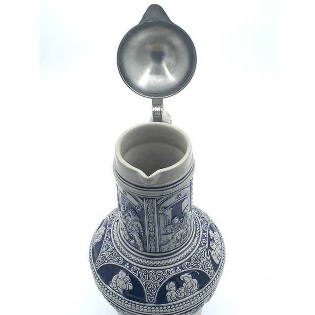 This is a magnificent vintage GERZ salt glaze stoneware stein, a true testament to traditional German craftsmanship! The...