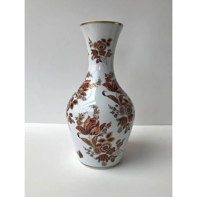 This is a vintage porcelain floral pattern vase. This is an Ouragan Ulysse Paris. The floral decor is made with 24k gold...