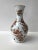This is a vintage porcelain floral pattern vase. This is an Ouragan Ulysse Paris. The floral decor is made with 24k gold...