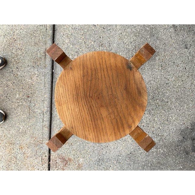 Solid wood pedestal plant stand with a round top and four-leg base. Suitable for use as a planter stand or decorative...