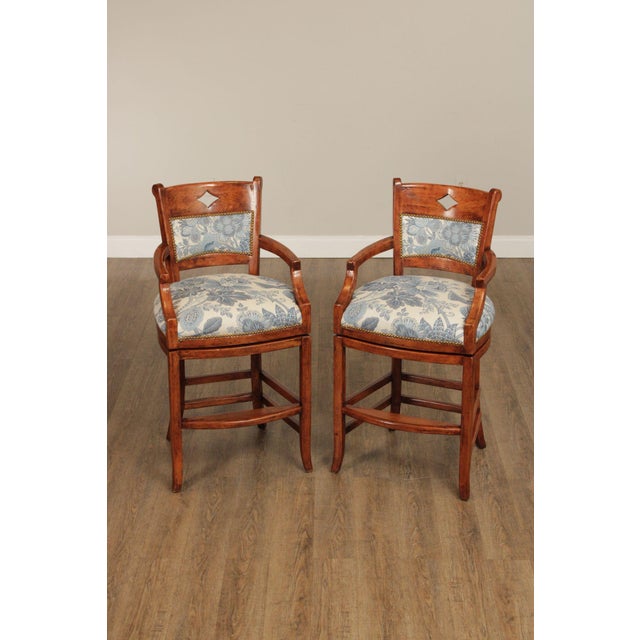 High Quality Pair of Newly Custom Upholstered Carved Frame Swivel Bar Stools with Brass Tack Trim and Diamond Cut Out By...