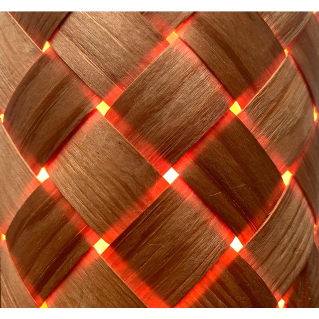 Swedish table lamp made of wood. Handmade table lamp from Vamhus. The diffuser is made of diagonally interwoven wooden...