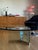 Mid-Century modern Pace Collection by Leon Rosen glass coffee table. Thick tempered glass nestled into a welded chrome Y...