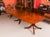 This is a fabulous Vintage Regency Revival dining table by master cabinetmaker William Tillman and a set of fourteen swag-...