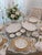 Elegant vintage Haviland Limoges porcelain dinnerware set featuring delicate pink rose garlands on fine white porcelain....