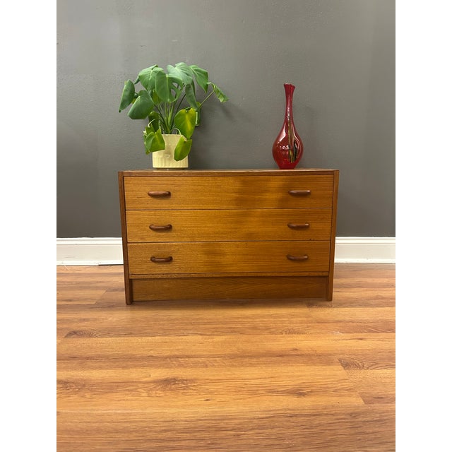 The Piece: Authentic vintage mid-century modern low dresser/credenza crafted in Denmark by Domino Møbler. Featuring...