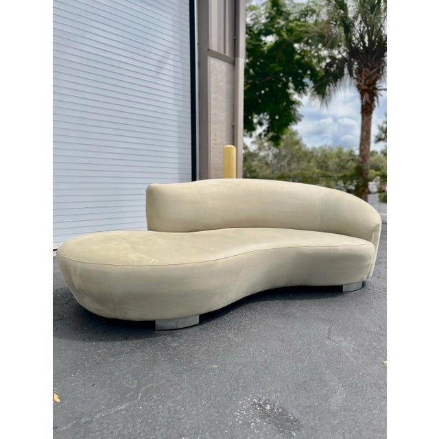 Vintage modern cloud sofa upholstered in a soft sage suede with chrome feet. Vladimir Kagan for Wieman. c.1980s. A...