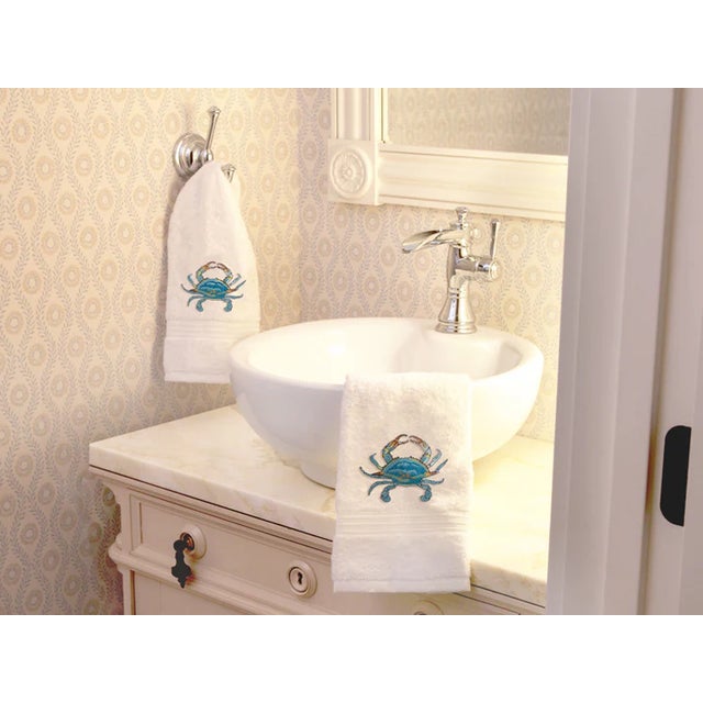 Our 100% Cotton Terry Guest Towels are durable, soft to the skin and super absorbent. The beautiful Atlantic Crab, Aqua...