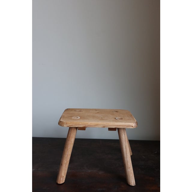 Hand formed stool with a raw, natural wood. Best for styling, using on shelves or countertops. Appears to be reclaimed...
