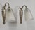Marcel Hudry & Lorrain Daum A pair of French art deco floral motif Art Deco wall sconces made circa 1925-1935 in nickel-...