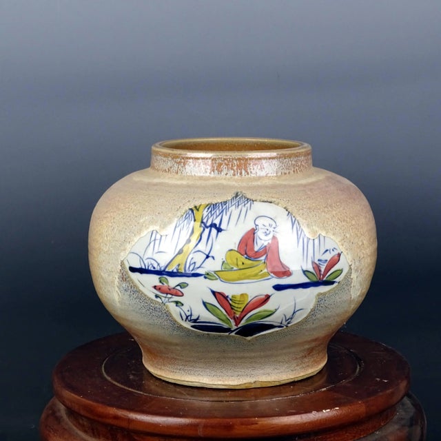 W-26cm,H-cm The product is a beautiful blue and white porcelain jar featuring hand-painted figures in the Famille Verte...