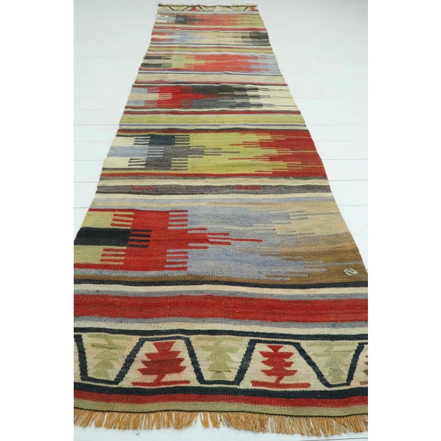 Beautiful vintage Turkish kilim runner rug made pure handspun wool and dyed naturally. Beautiful colours. this vintage...