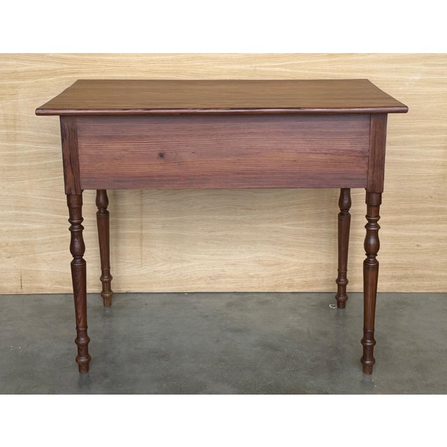 Spanish Country side table with drawer. Made of antique pine called "mobila", this table is very functional and you can...