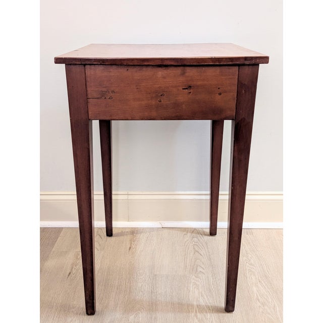 An exceptional early 19th-century Southern Federal country Hepplewhite one-drawer stand, sourced in North Carolina and...