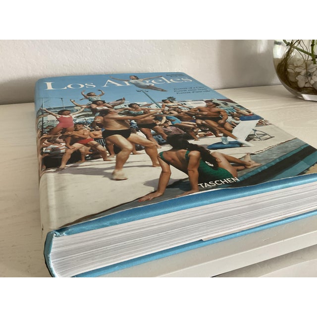 The internal pages are crisp and unmarked with a perfectly tight binding. The dust jacket is intact and vibrant, showing...