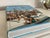The internal pages are crisp and unmarked with a perfectly tight binding. The dust jacket is intact and vibrant, showing...