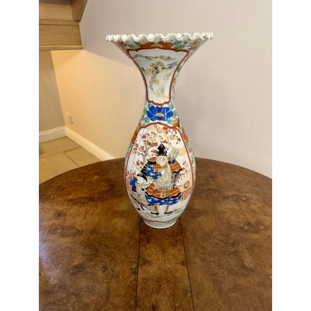 Fine quality large antique Japanese imari vase, having a quality shaped vase with a bulbous shaped body terminating into a...
