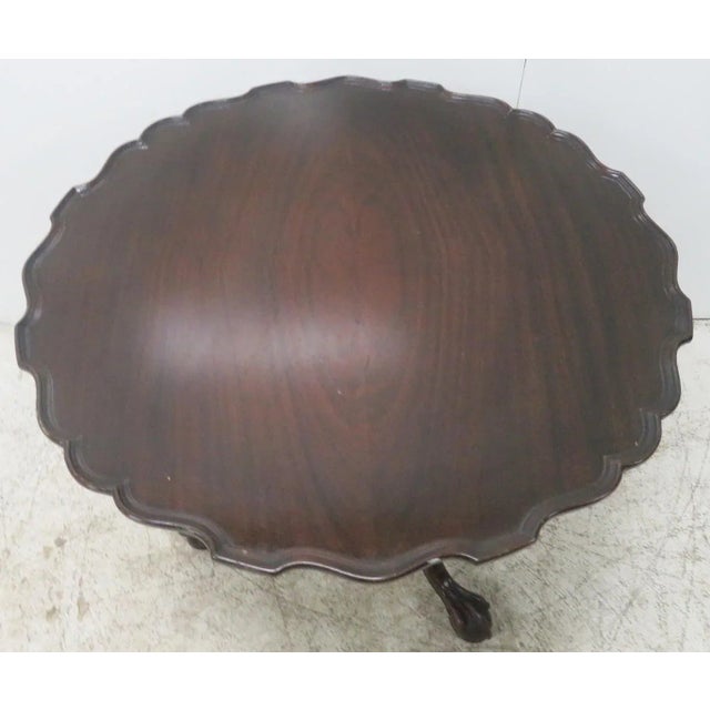 1940' S Chippendale tilt top table with claw and ball feet , pie crust edging , birdcage rope twist pedistal