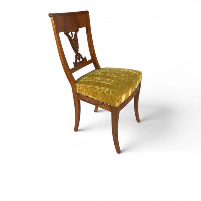 Set of Four Biedermeier Dining Chairs, Germany, circa 1820 This elegant set of four Biedermeier dining chairs dates to...