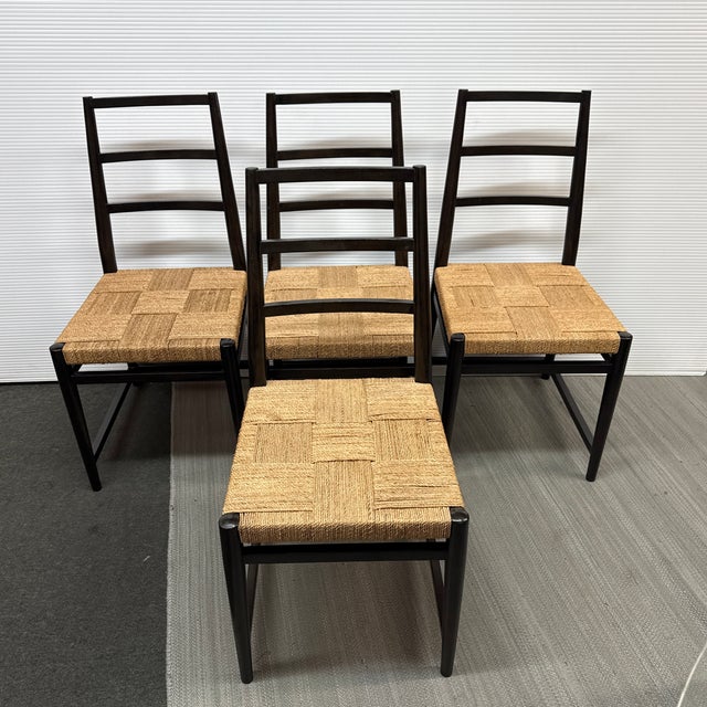 Design Plus Gallery presents a Set of Four Dining Side Chairs. They chairs are an interpreted style of rustic with a blend...