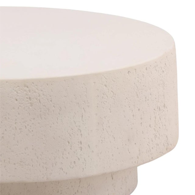 Modern white lightweight concrete round coffee table. Minimalist simple design with subtle textured finish. Can be used...