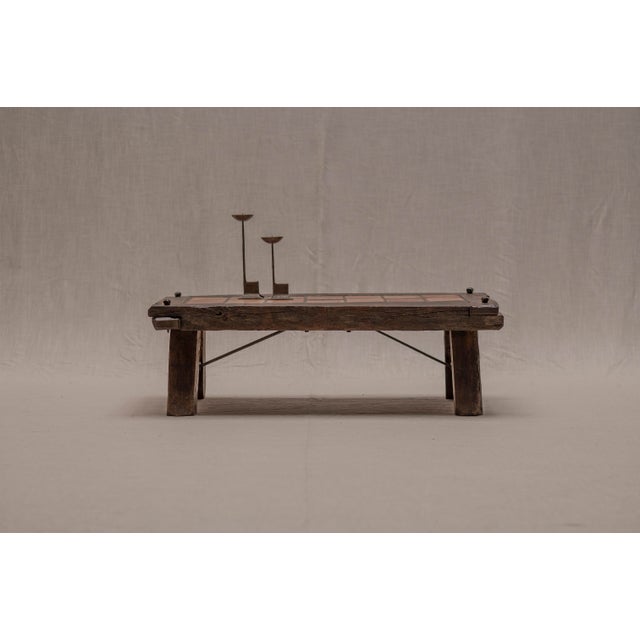 Exceptional French mid-century brutalist coffee table, handcrafted from solid oak and finished with a ceramic tiled...
