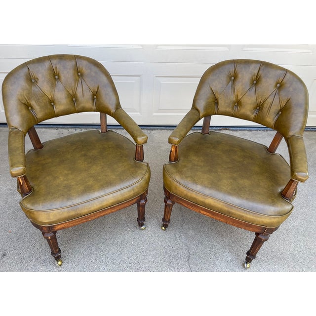 A handsome set of four vintage club chairs by Lewittes Furniture, Inc. of Taylorsville, North Carolina, featuring original...