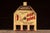 Countertop "Electric Snack House" hot dog warmer with a house-form sheet metal body, pitched roof, and chimney-style vent....
