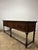 Some pieces of furniture reveal themselves slowly. From across the room, this antique English oak sideboard impresses...