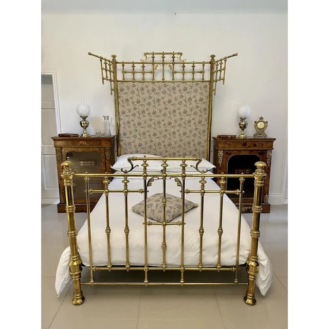 Magnificent exhibition quality antique Victorian gilded solid brass half tester double bed having a newly reupholstered...