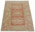 Hand-knotted with care using traditional rug-making techniques, this wool rug blends timeless craftsmanship with a modern...