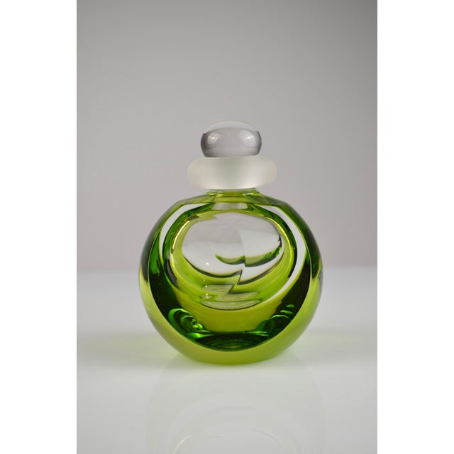 Elegant crystal perfume bottle set produced by the prestigious French crystal manufacturer Saint-Louis. The piece is...