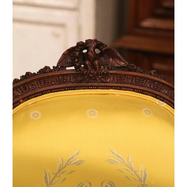Pair of 19th Century French Louis XVI Walnut Fauteuils With Eagle Crest For Sale - Image 9 of 10