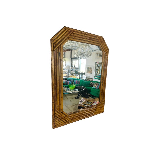 This vintage coastal split rattan vanity and matching mirror has seven drawers and a knee hole area for a stool/chair. The...