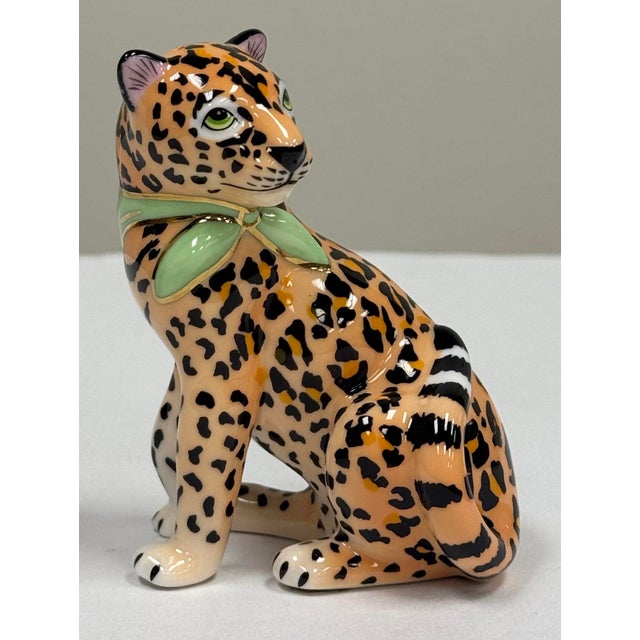 Porcelain leopard or jaguar figure salt shaker featuring bold color and 24k gold accents. Manufactured and marked with...