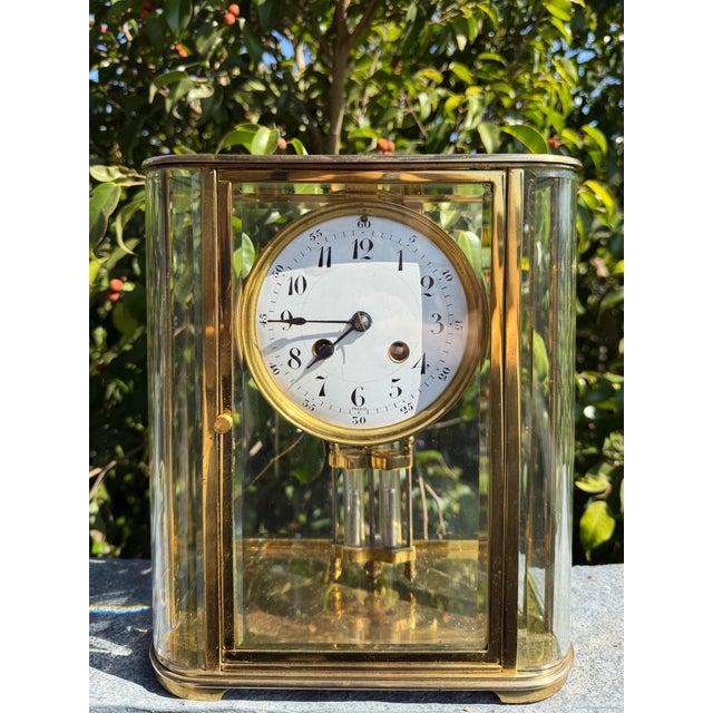 This listing is for a rare antique French crystal regulator mantel clock. This clock has an unusual case with curved glass...