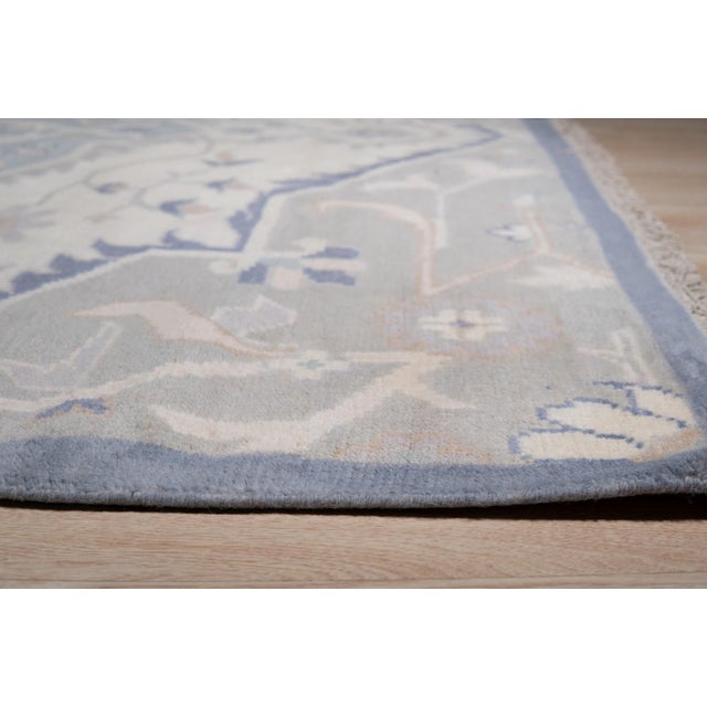 Stylish Trendy Ivory Hand Knotted Wool Rug, Country of Origin: India. This exquisite piece showcases the exceptional skill...