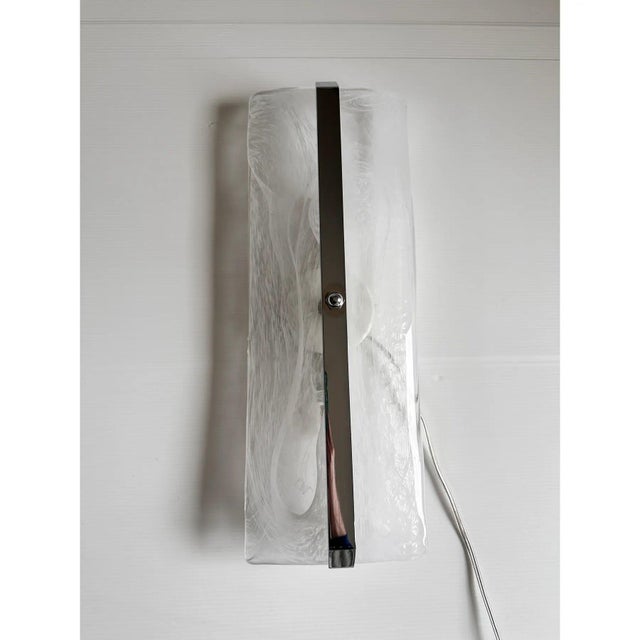 Transparent venied-white "alabastro" murano glass wall sconces with metal frame on view in chrome. a jewel of high italian...