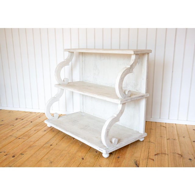 A gorgeous, versatile and unique Regency style waterfall shelving unit in lovely vintage condition. Likely made in rural...