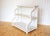 A gorgeous, versatile and unique Regency style waterfall shelving unit in lovely vintage condition. Likely made in rural...