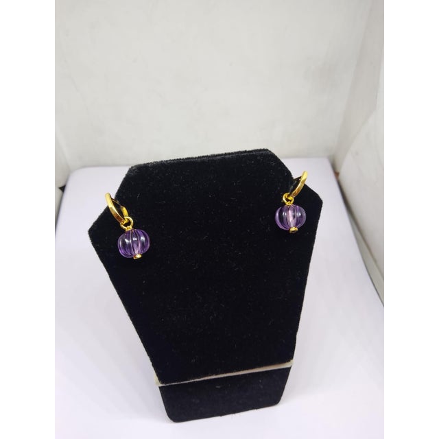 Product Details: - ➜ Metal: - 14k Yellow Gold —> Primary Stone Details - Emerald: 0.10 cts Amethyst: 8.45 cts Net...