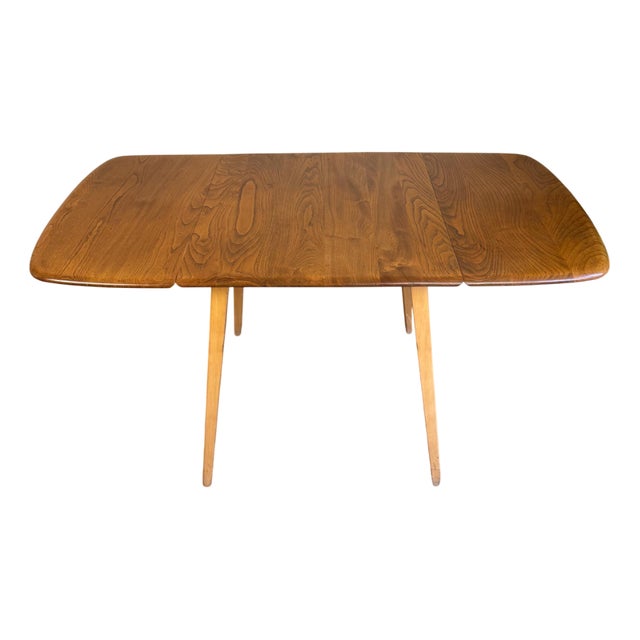 Rectangular Drop Leaf Extending Dining Table in Elm from Ercol, 1950s For Sale